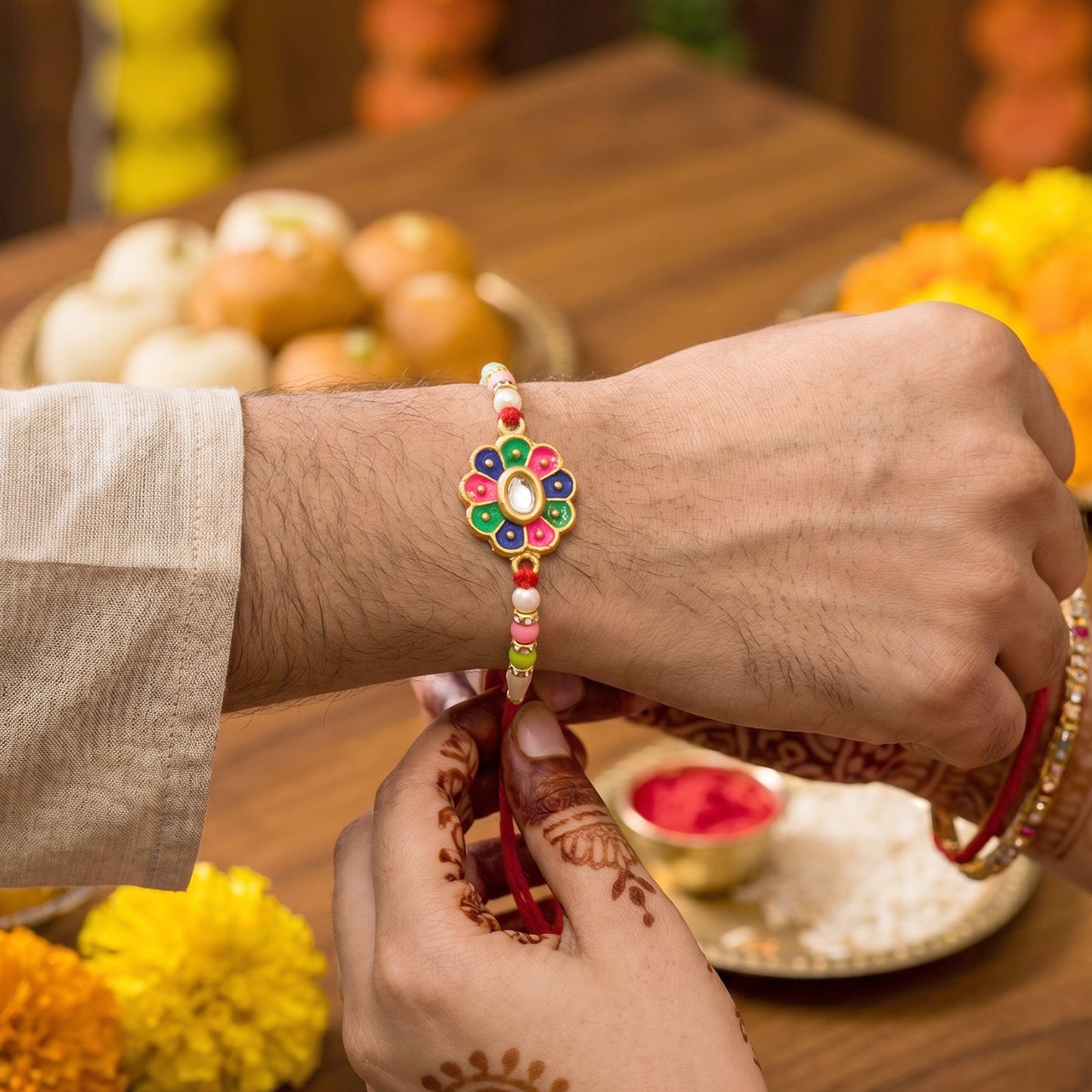 Multicolor Flower Rakhi with Pastel Beads and Fresh Festive Look