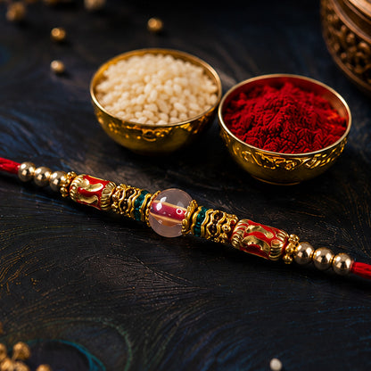 Red Green Stone Golden Designer Rakhi with Traditional Beads and Festive Thread