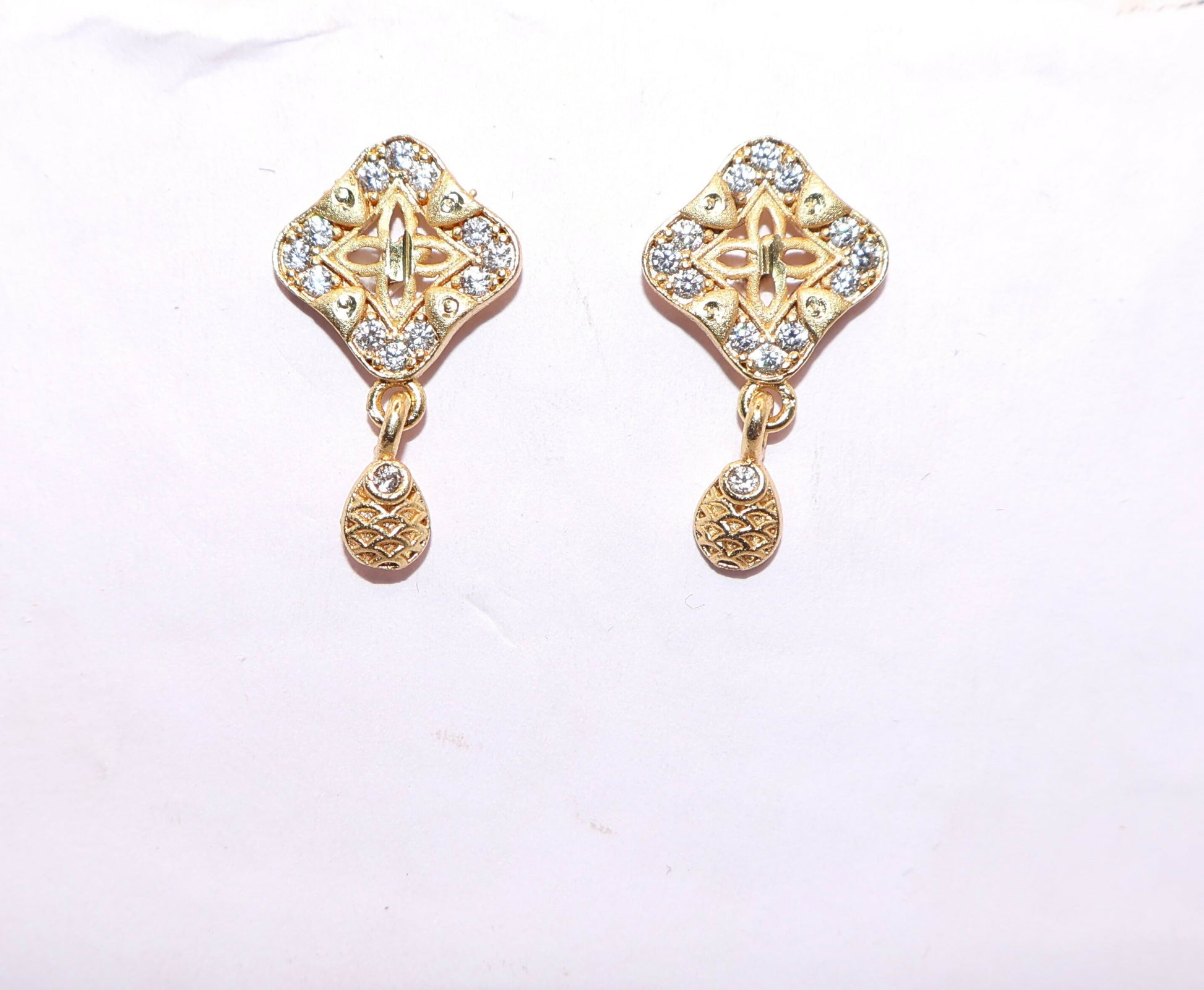 Pair of gold plated square stud earrings with delicate dangling drops