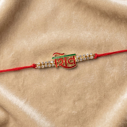 Shiv Letter Rakhi with Crystal Row and Red Mauli Thread