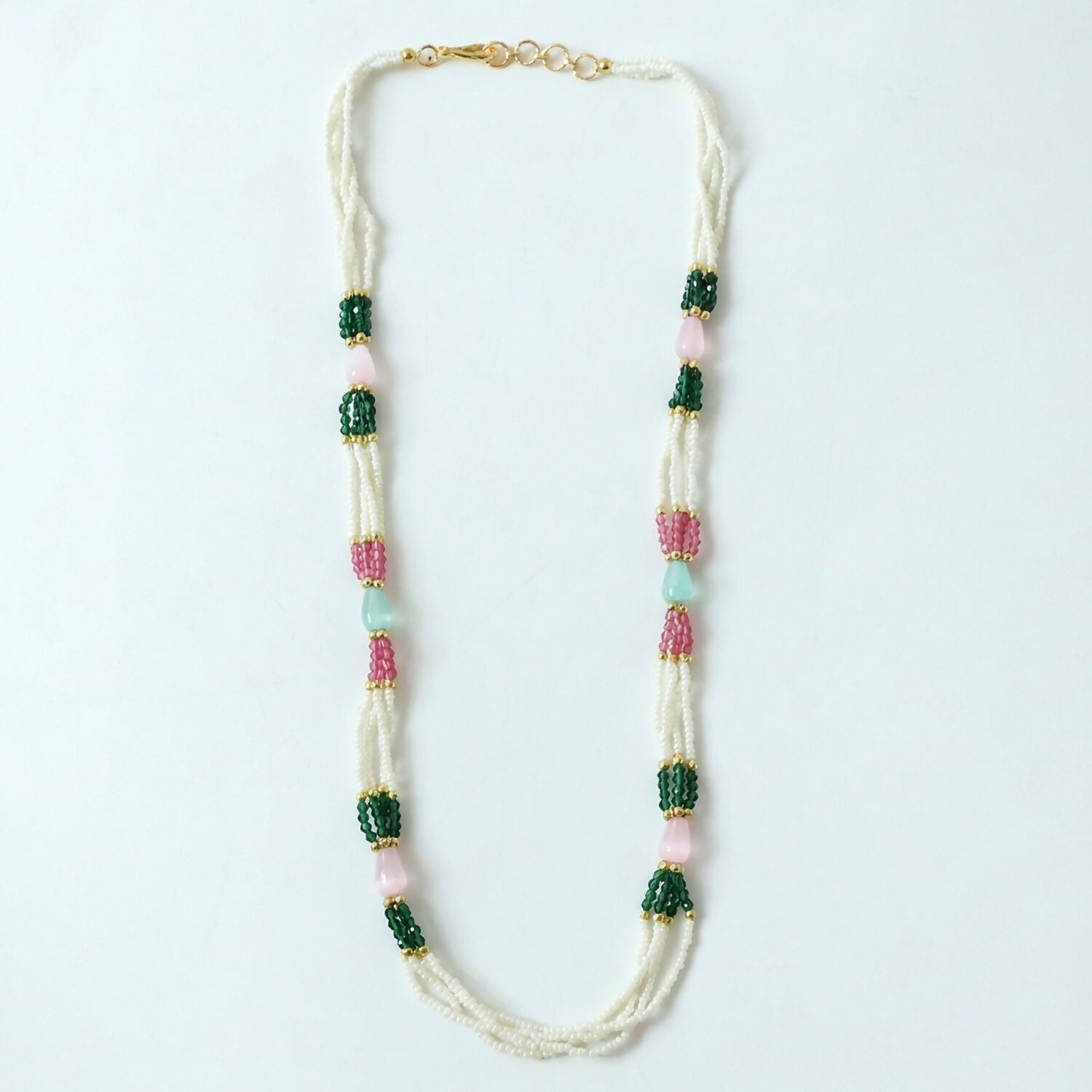 Festive style pearl necklace with green and pink stones