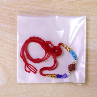 Blue Red Beaded Rakhi with Gold Accents and Classic Festive Brother Gift Appeal Ideas