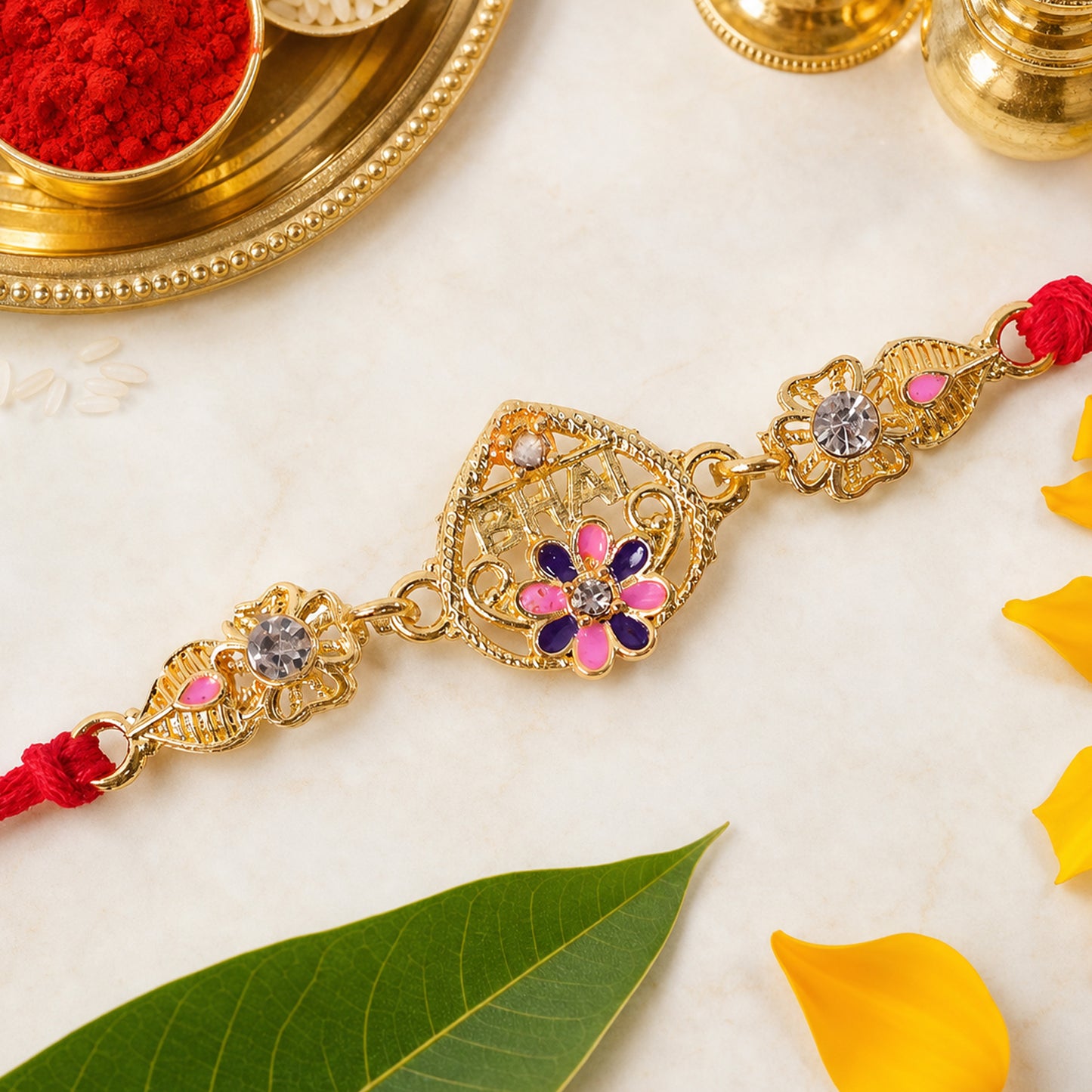 Festive Rakhi featuring Ornate Floral Charm, pearl accents and chain look for Gift
