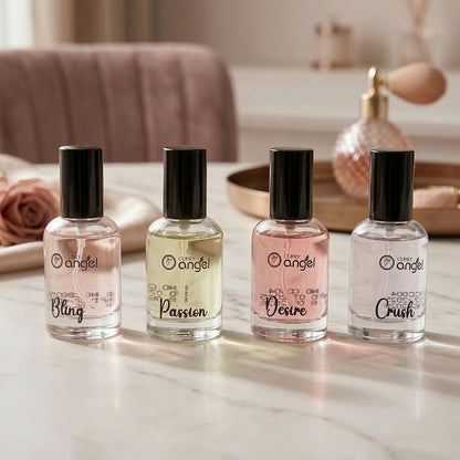 Four Cupid perfume miniatures on white background