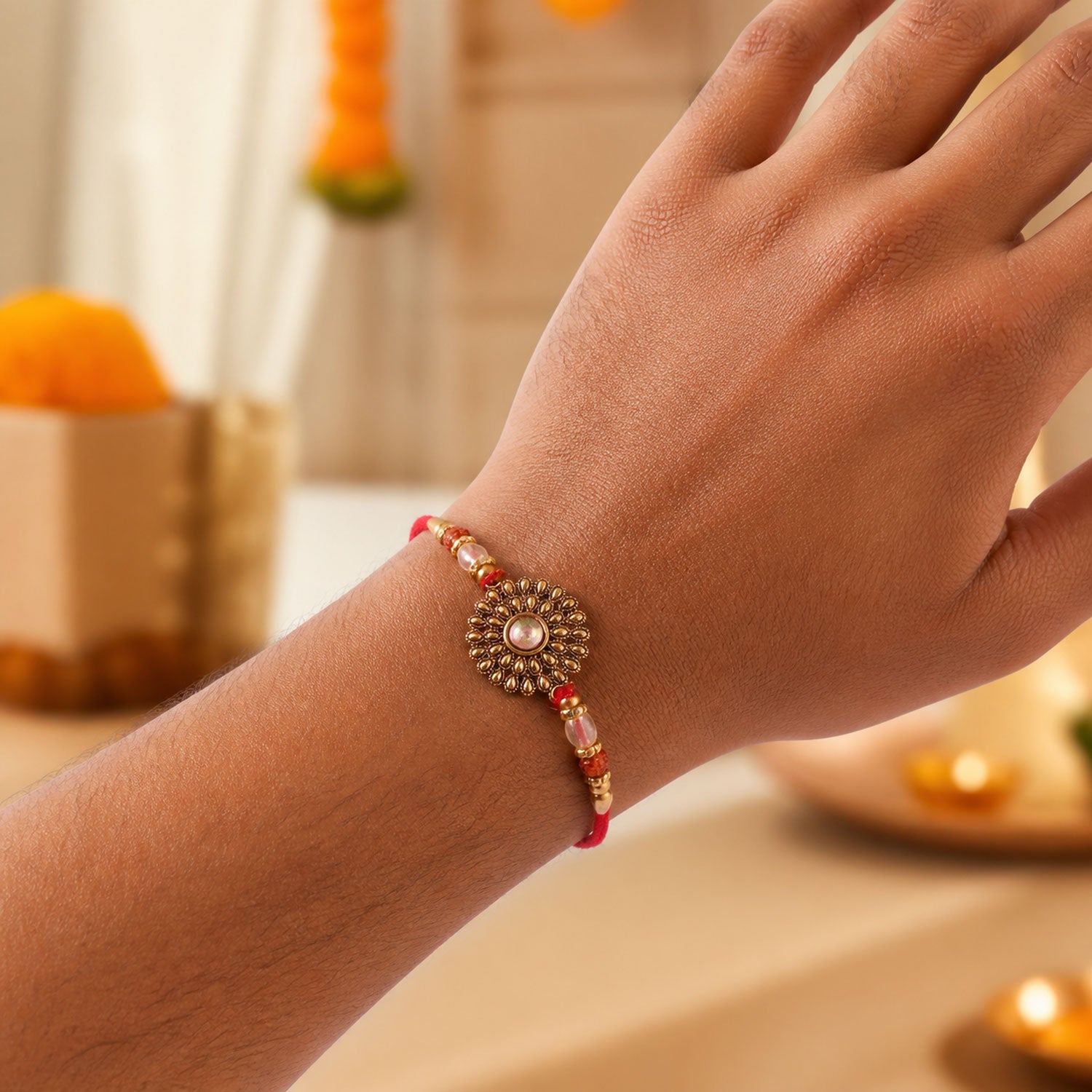 Oxidized Gold Floral Sunburst Pendant Rakhi with Rudraksha and Pearl Beads