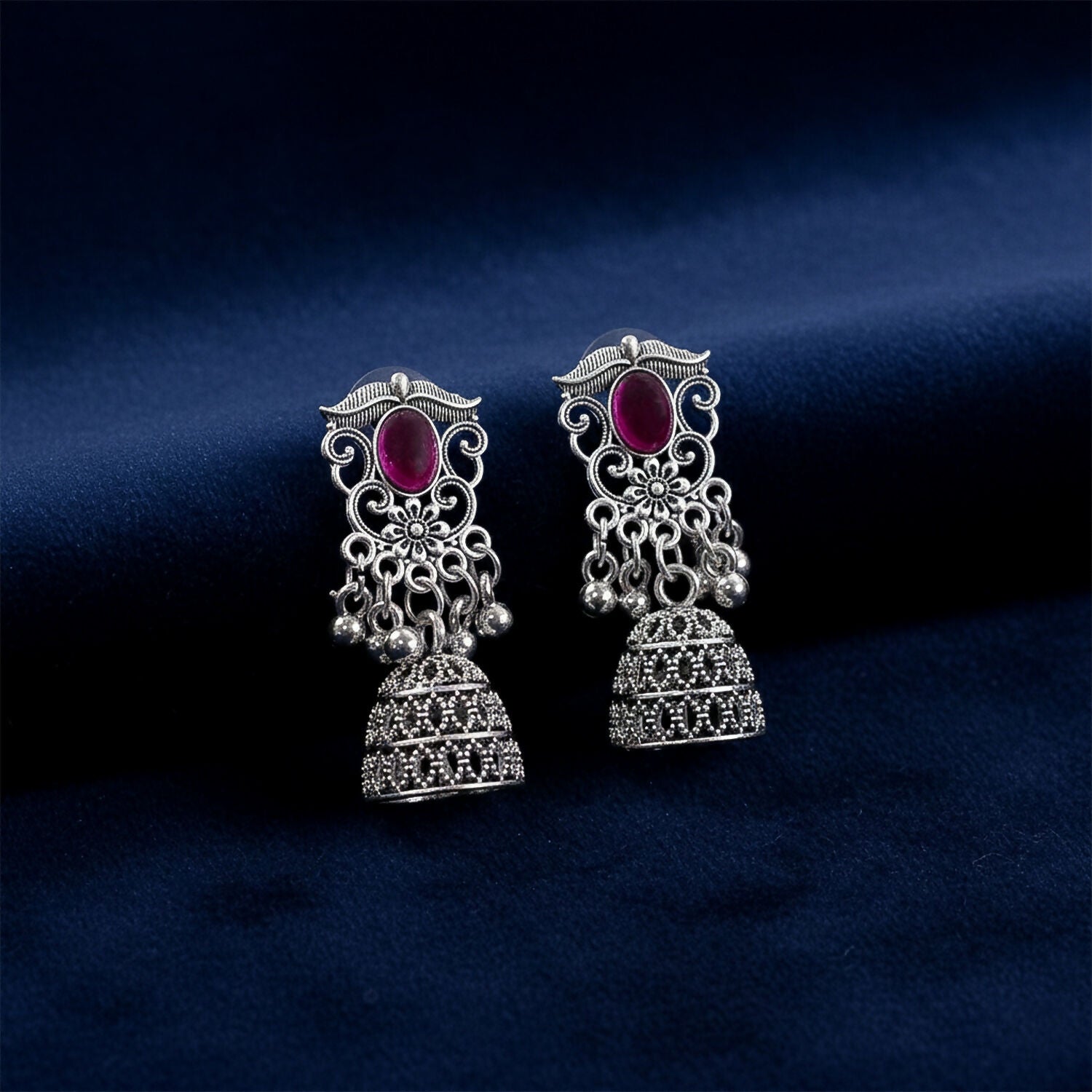 German Silver Jhumka Earrings with Red Monalisa Stones