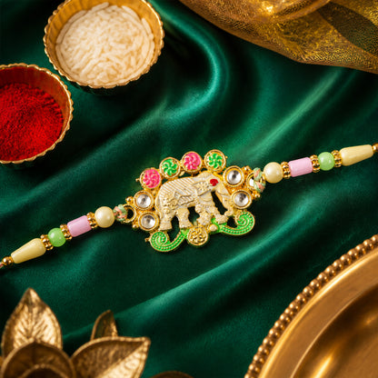 Festive Rakhi showcasing Elephant Charm, gold trims and display look for Gift Use