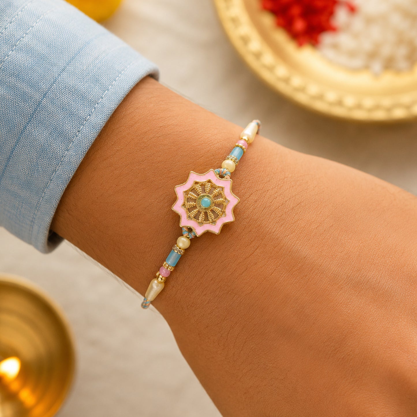 Pastel Floral Charm Rakhi with Pink Blue Beads and Elegant Festive Gift Styling Ideas
