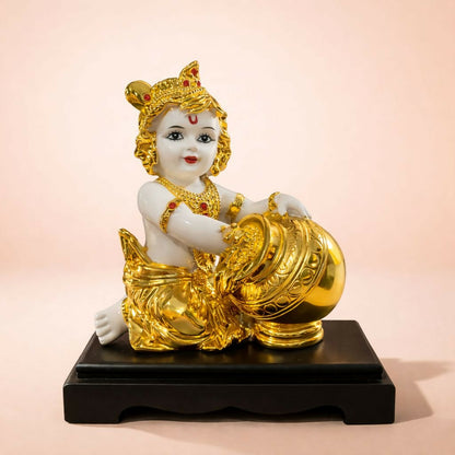 Golden Bal Krishna idol showing detailed craftsmanship