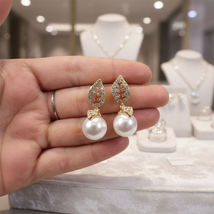 Pearl drop detail of earrings