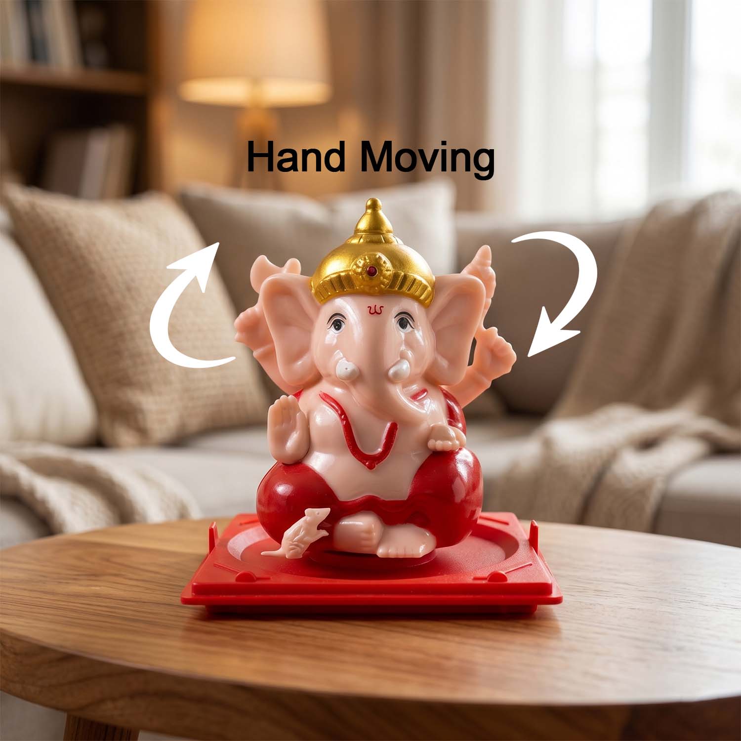 Ganesha idol detail with red and gold accents