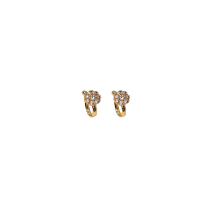 Close-up of gold plated nose pin featuring sparkling Cubic Zirconia stones cluster
