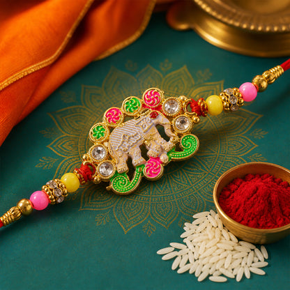 Festive Rakhi featuring Elephant Charm and gold trims in display look for Gift Use