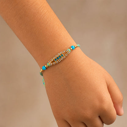 Pointed Oval Motif Rakhi with Shimmering AD Stones (Pack of 6)