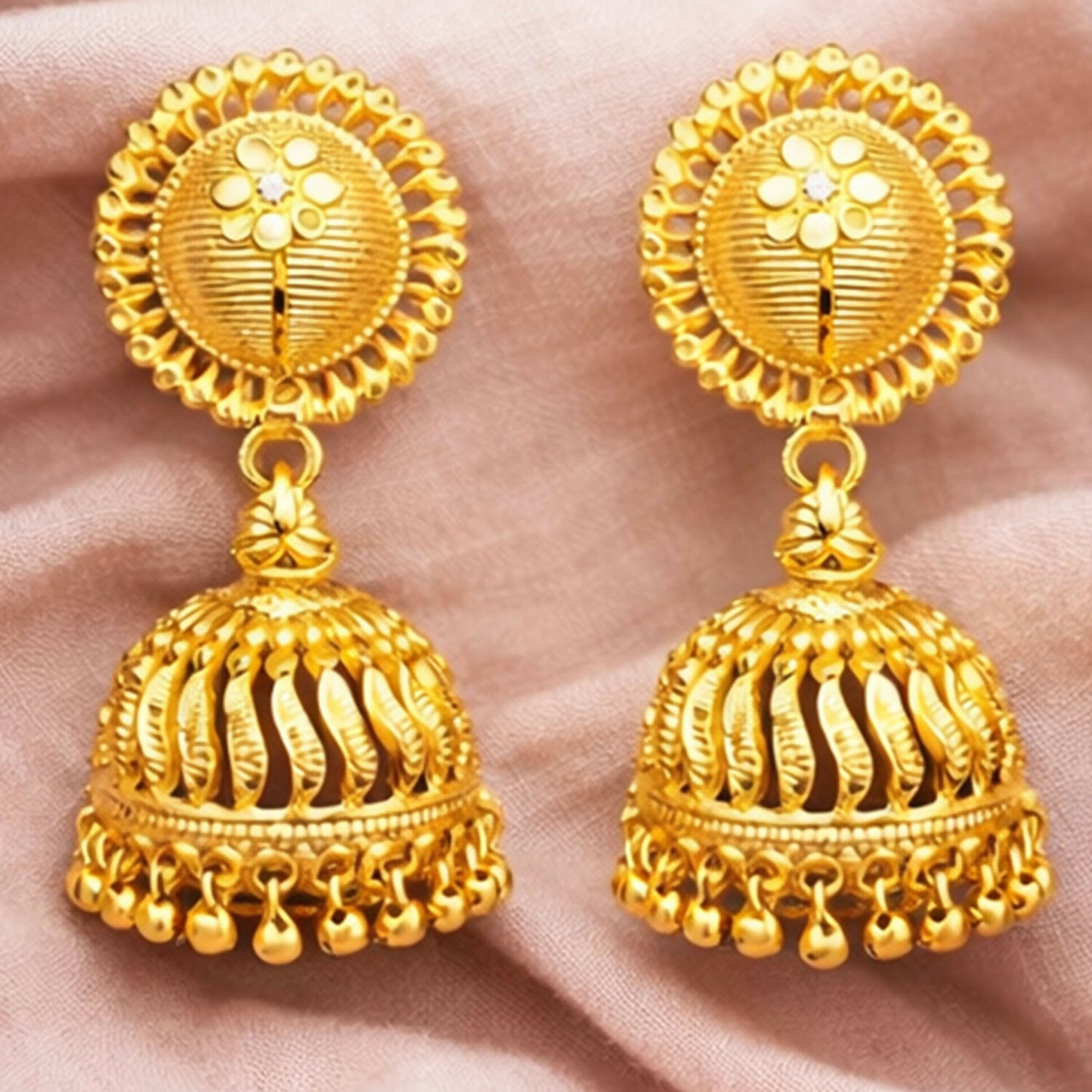 Pair of lightweight gold plated jhumka earrings perfect for weddings and festivals