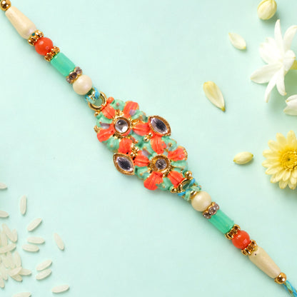 Marigold Style Floral Kundan Pendant Rakhi with Teal Beads