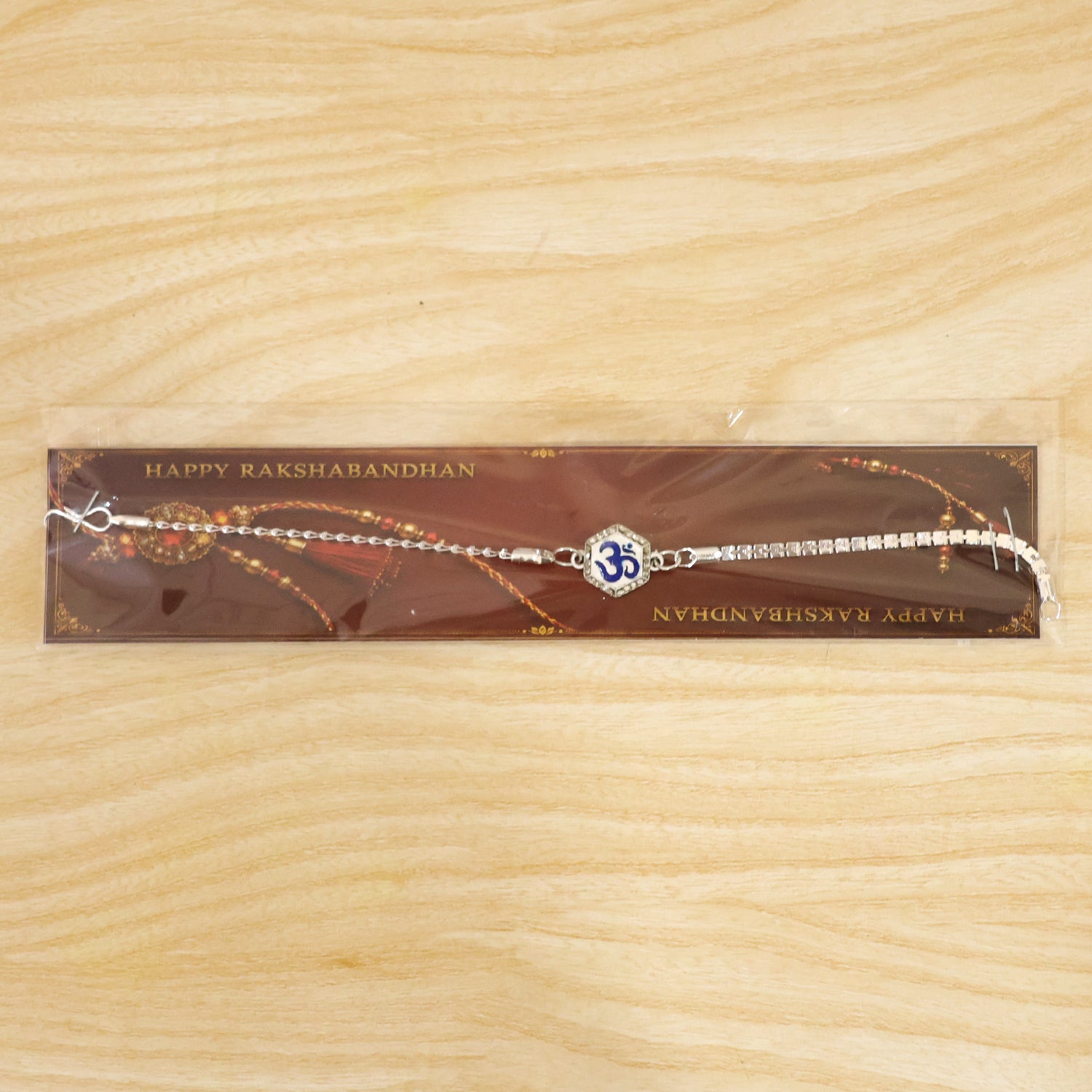 Om Charm Crystal Studded Enamel Silver Chain Designer Rakhi