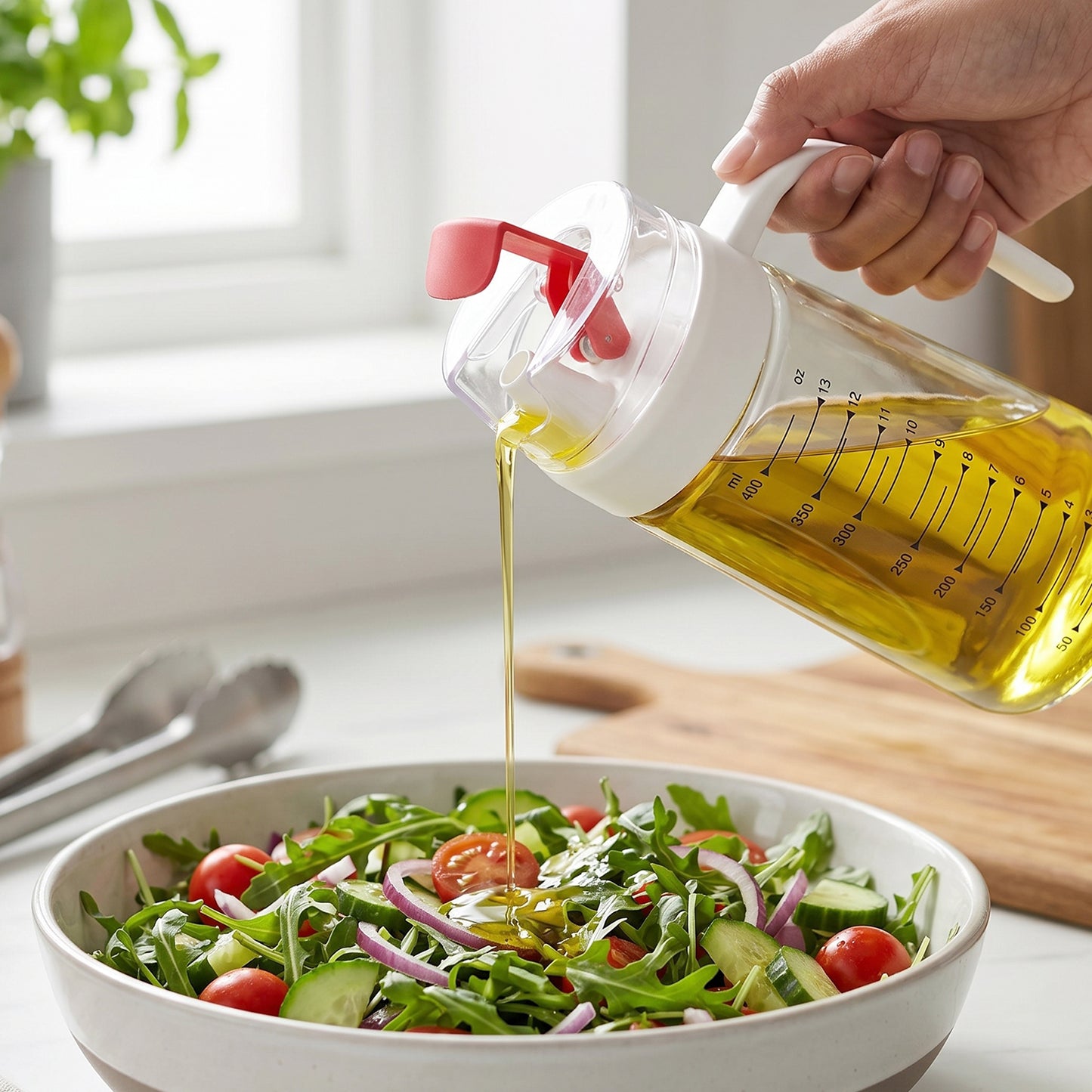 Hand Holding Glass Oil Bottle Drizzling Olive Oil onto Arugula Salad