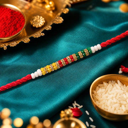 Red Braided Rakhi with Green, Yellow and White Bead Pendant Row