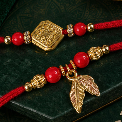 Red Bead Floral Rakhi Pair with Leaf Charms for Bhaiya Bhabhi Couple Celebration