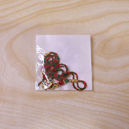Colorful Enamel Peacock Pendant Rakhi with Red and Green Beads