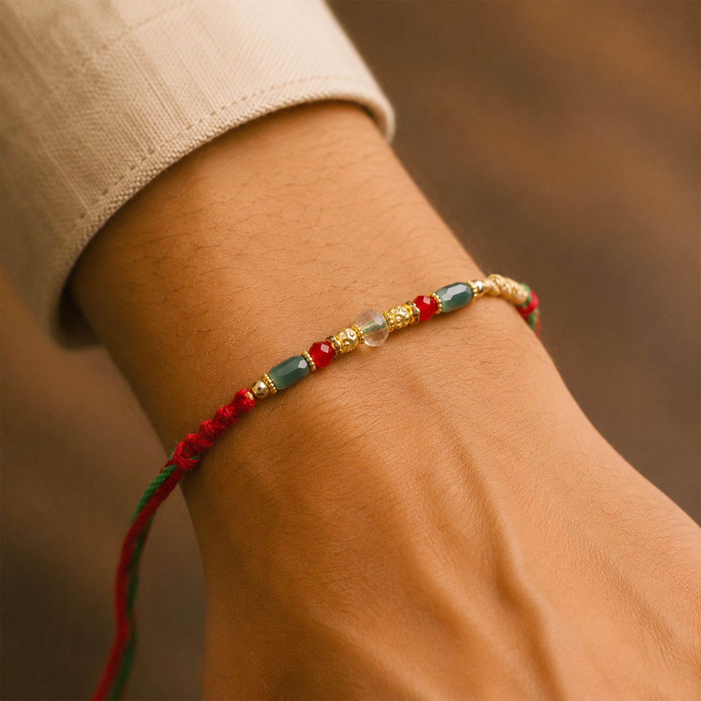 Beautiful Pearl Bead Rakhi with Soft Festive Shades and Elegant Designer Look