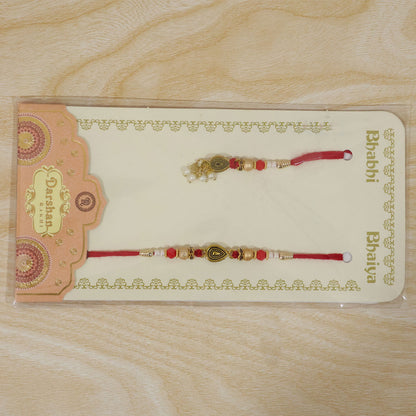 Graceful Teardrop Eye Bhai Bhabhi Rakhi with Drop Pendant and Pearl Tassel for Gift