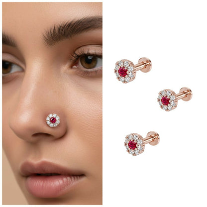 Set of three rose gold nose pins with ruby stones and diamond halo accents