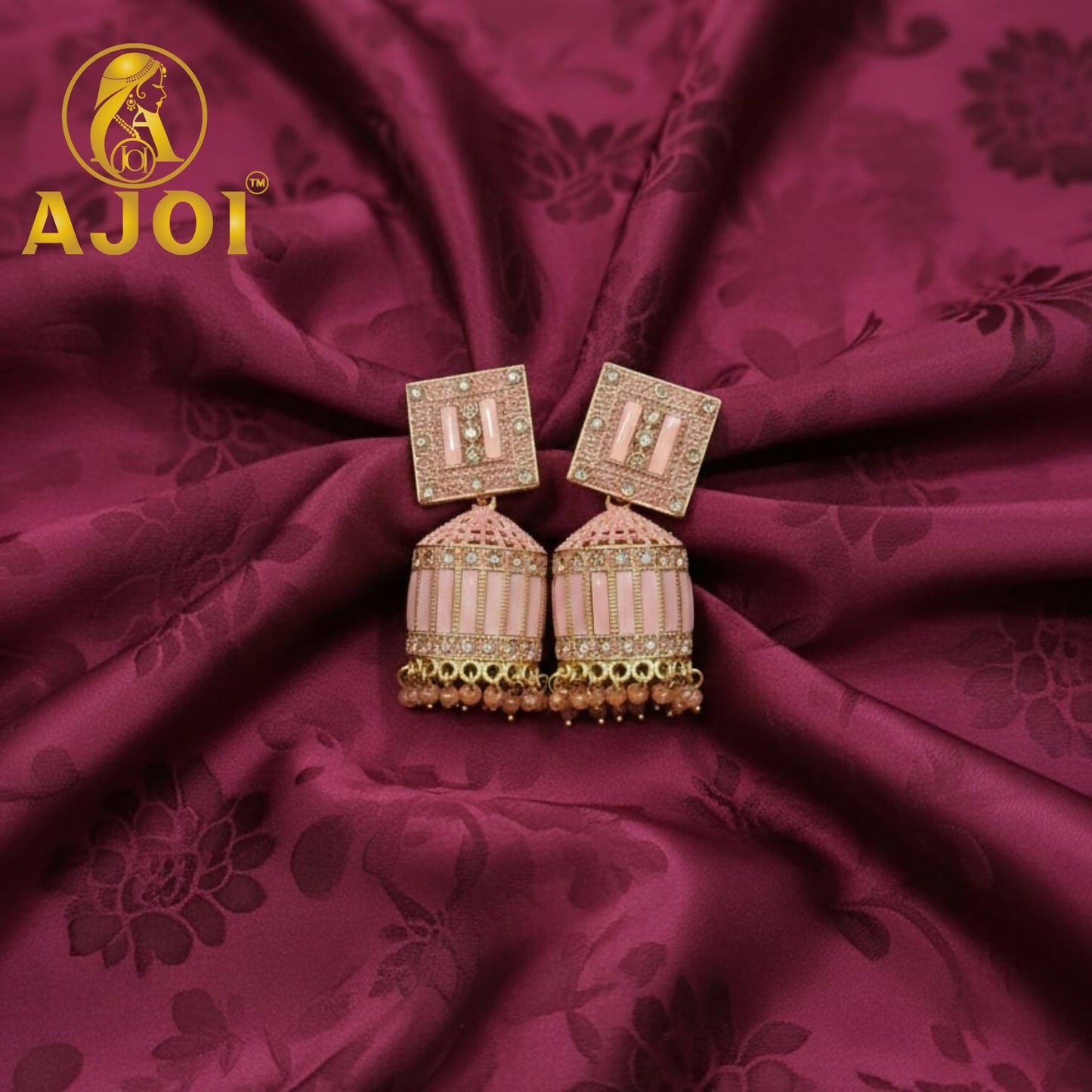 Blush Pink Designer Earrings with Elegant Stone Detailing and Drop Finish