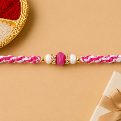 Pink-White Braided Rakhi with Rose-Pink Stone Bead Pendant
