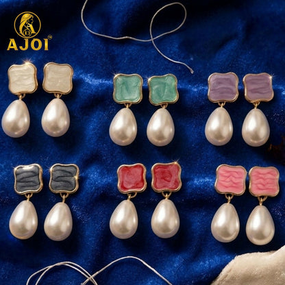 Stylish pearl Tilak earrings designed for weddings and festive occasions