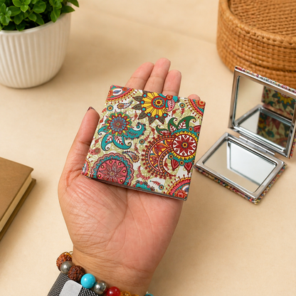 Close-up of stylish designer cover on folding makeup mirror