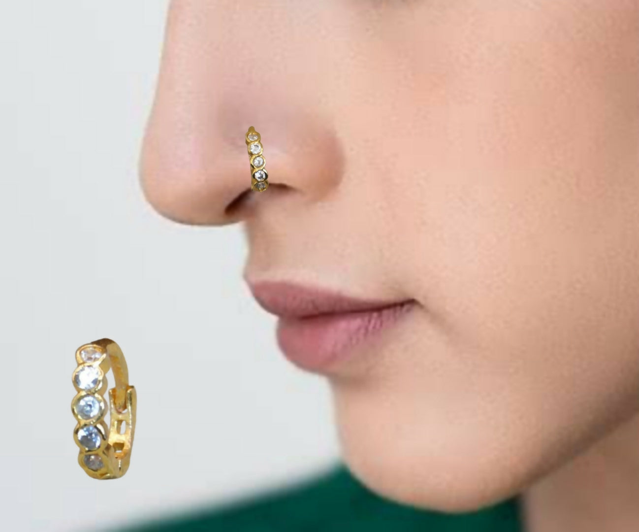 Close-up of gold plated nosepin hoop ring showing sparkling cubic zirconia crystals