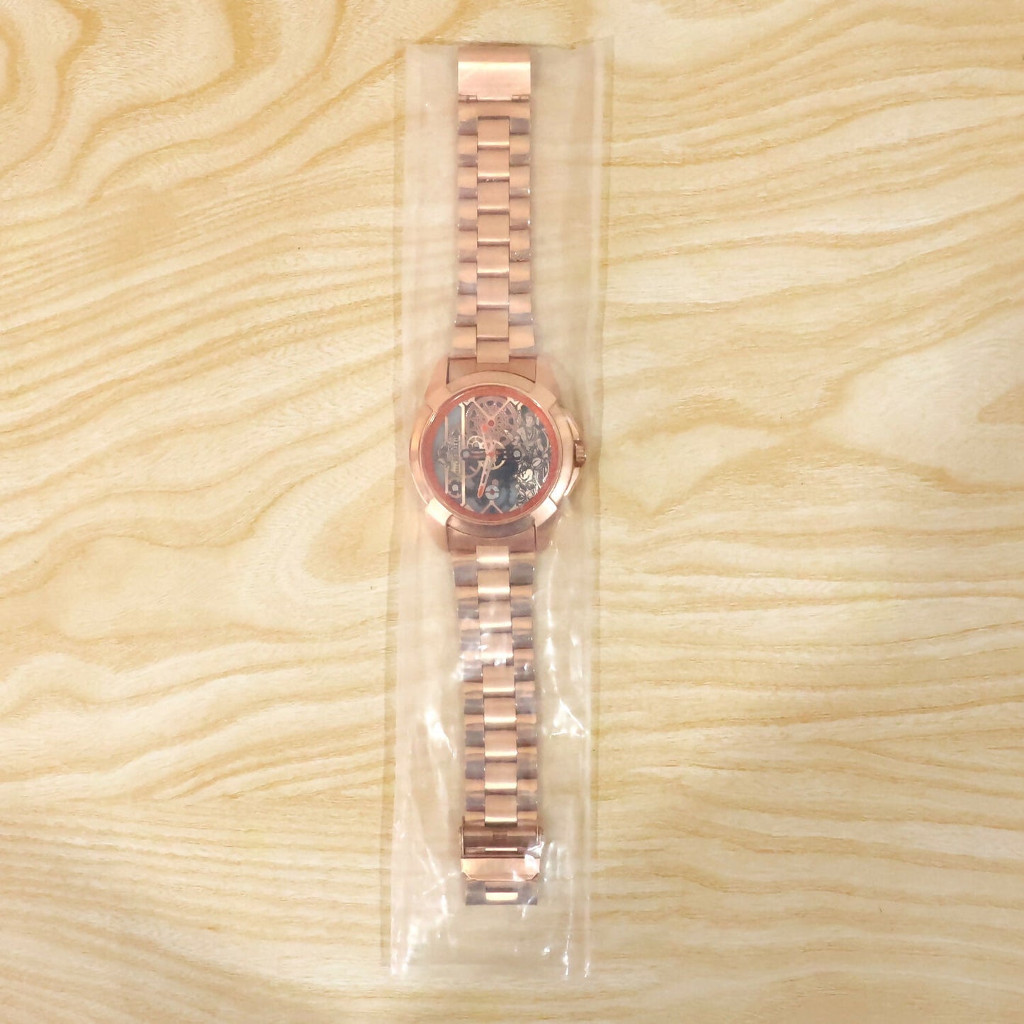 Back side of Jai Shri Ram rose gold metal chain watch