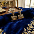 Antique Gold-Plated Leaf Design Jhumka Earrings – Elegant Festive Accessory