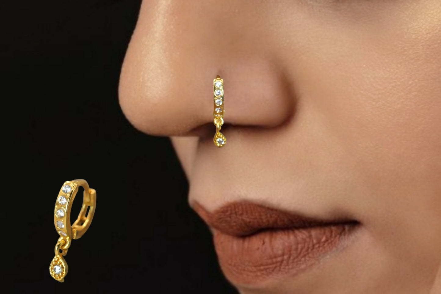 Close-up of gold plated teardrop dangle on huggie earrings for women and girls
