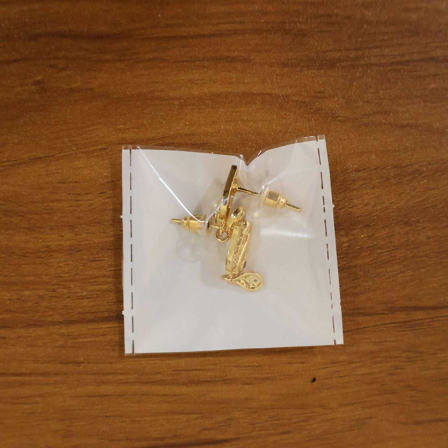 Elegant Gold Plated Stud Earrings with Ruby Accent & Drop Design