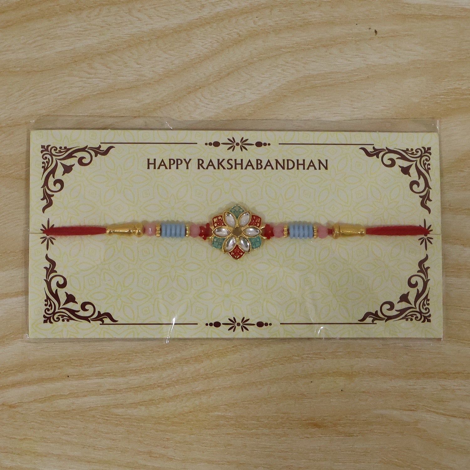 Festive styled floral kundan designer rakhi with star petal motif