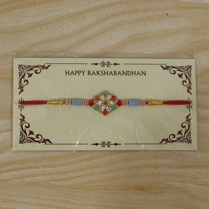 Festive styled floral kundan designer rakhi with star petal motif