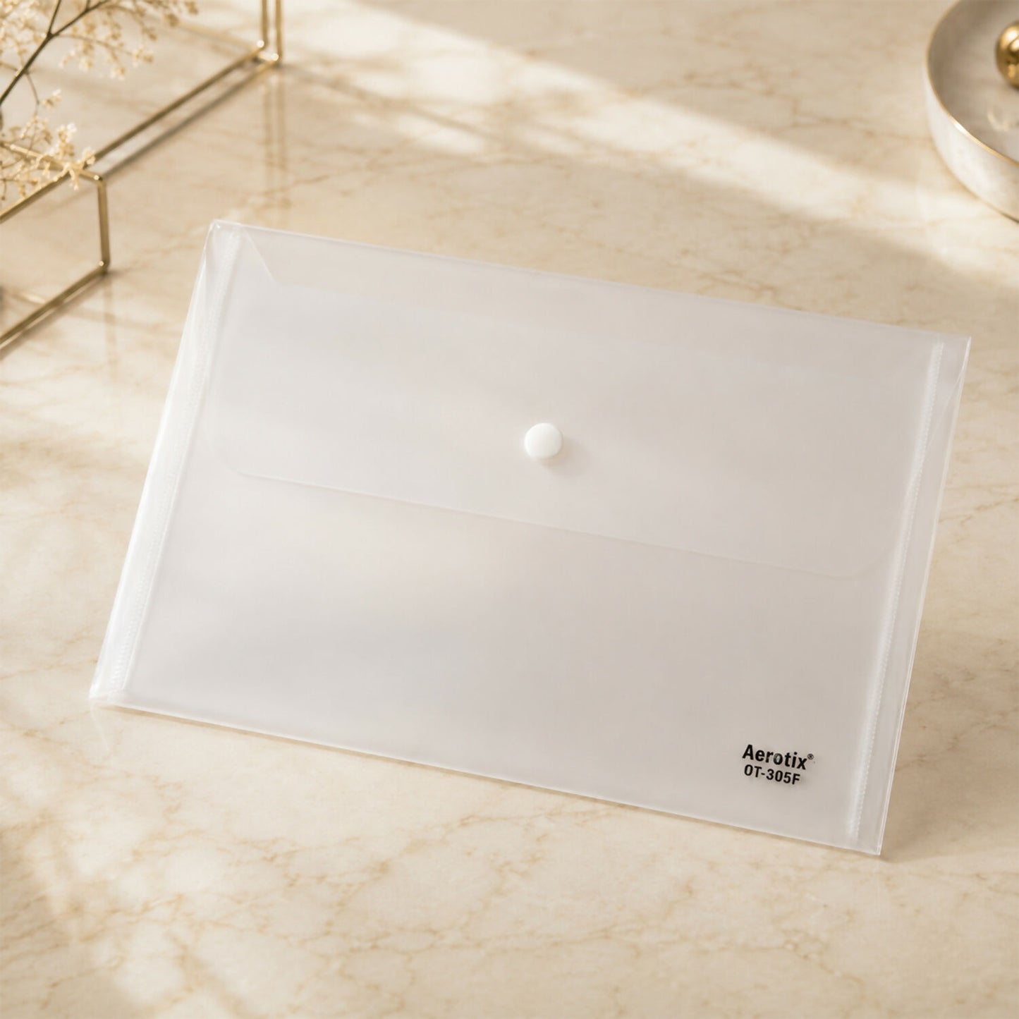 Close-up of snap button on clear file folder