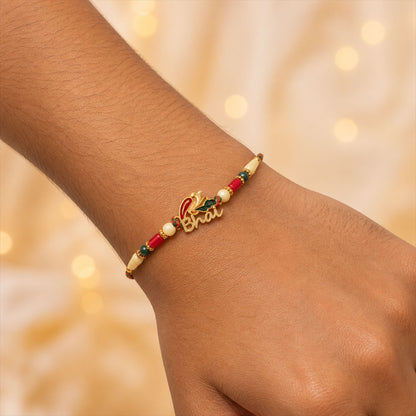 Bold Rakhi showcasing Devanagari Script Charm, bead line and plaque look for Gift Use