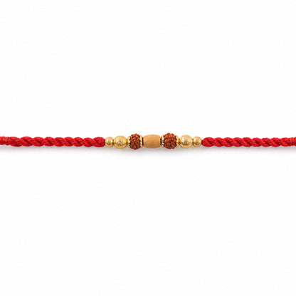 Red Thread Rakhi with a Row of Natural Rudraksha Bead Pendant