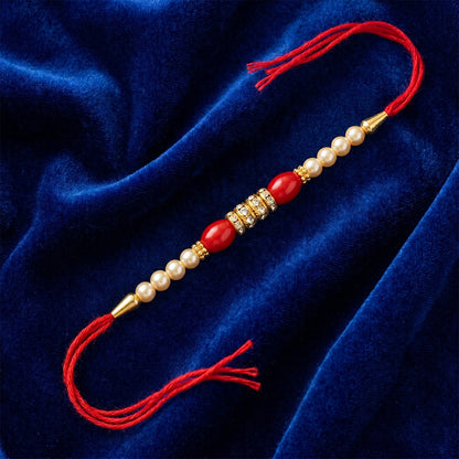 Red Moti Rakhi with Pearl Line and Antique Gold Spacer Beads