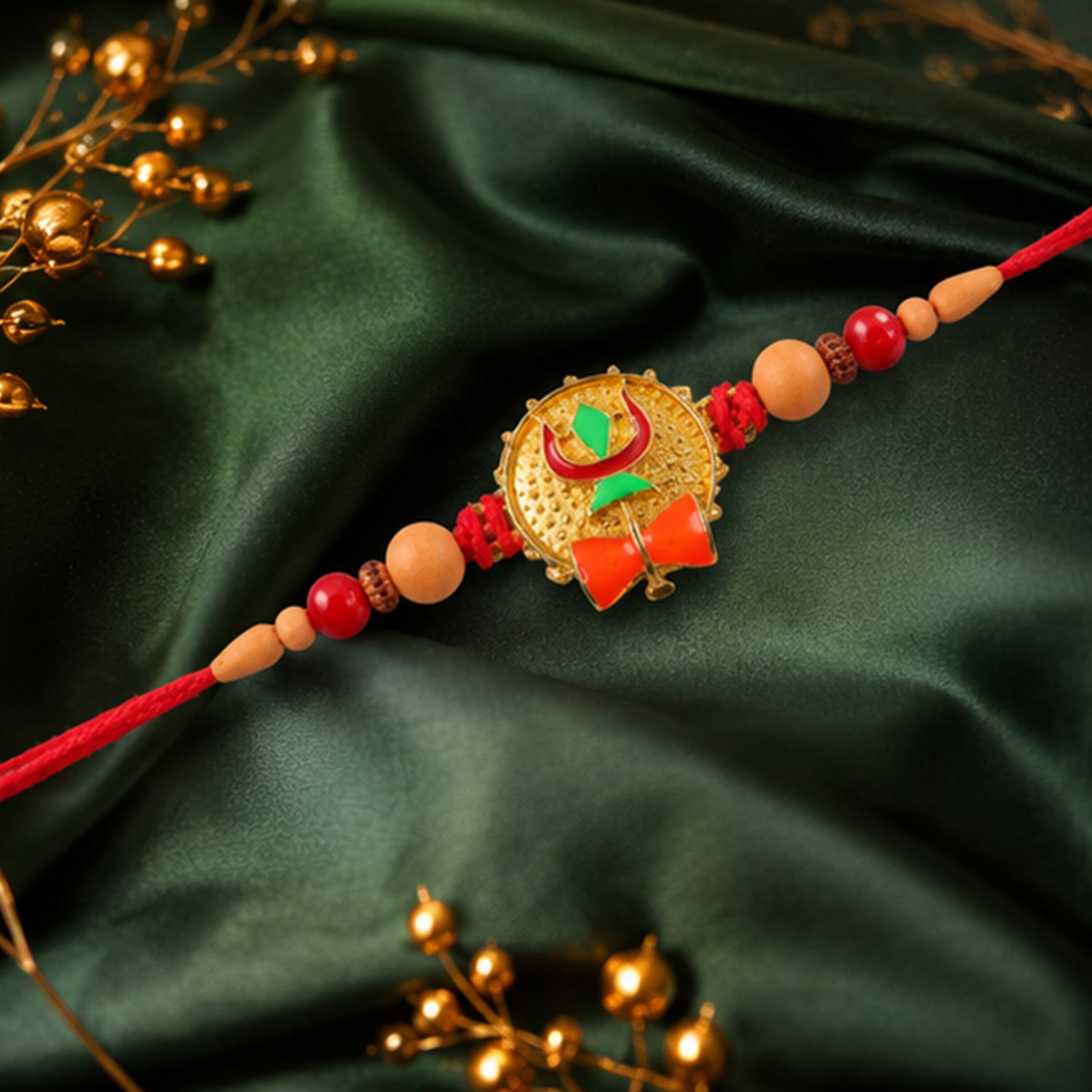 Trishul Damru Rakhi with Peach Beads and Red Thread