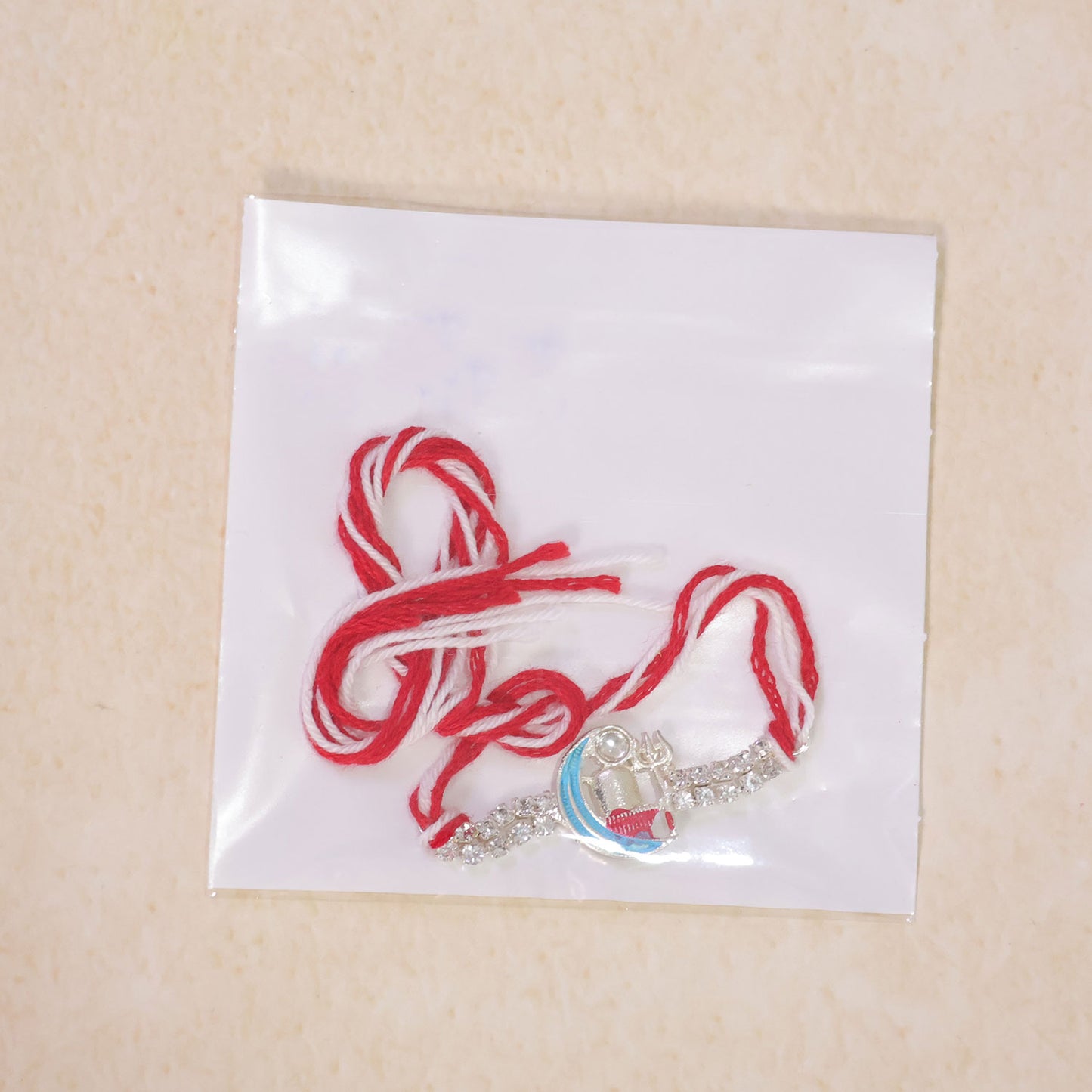 Premium Rakhi with Crescent Moon Charm, leaf touch and gift style for Raksha Bandhan