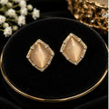 Champagne Geometric Stud Earrings with Gold-Tone Frames and Clear Stone Accents