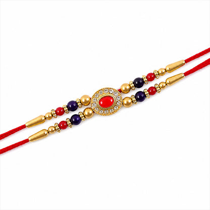Red Blue Beaded Rakhi with Ruby Center and Rich Traditional Festive Gift Styling