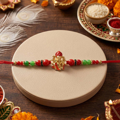 Traditional Rakhi with Ganesha centerpiece and soft thread