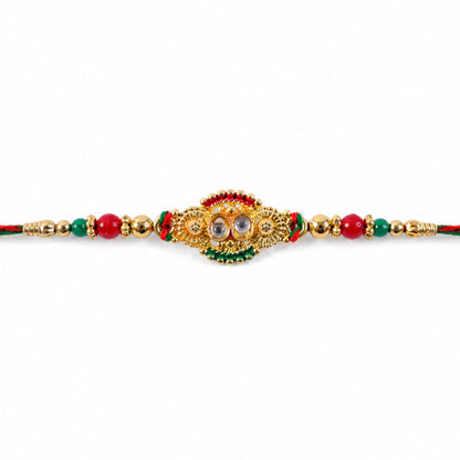 Kundan Cluster Oval Pendant Rakhi with Red and Cream Beads