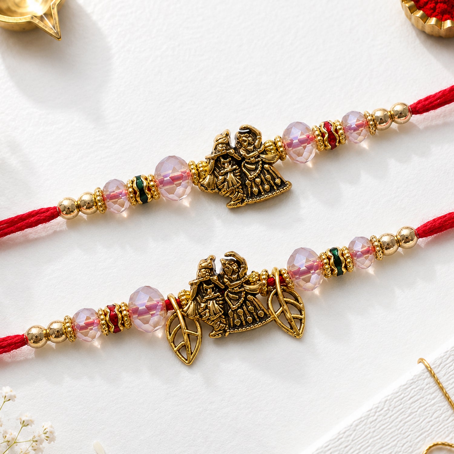 Radha Krishna Couple Rakhi Set with Pink Crystal Beads and Antique Leaf Charm Gift